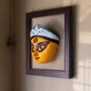 Right Profile of a vibrant handmade Terracotta Durga Wall Hanging on a jute background, showcasing intricate details of Maa Durga's face, a prime example of Bengal crafts.